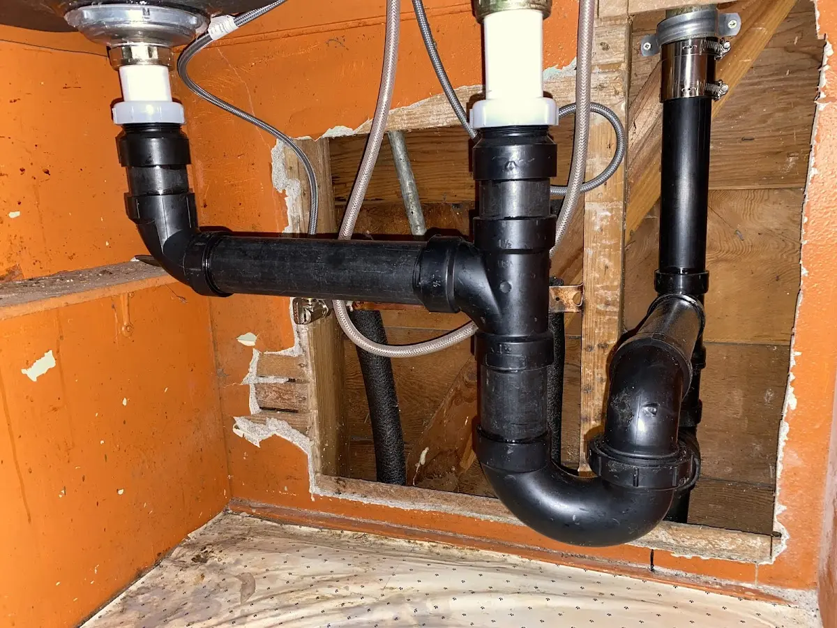Professional Garbage Disposal Repair equipment and tools on the job in South Hanover